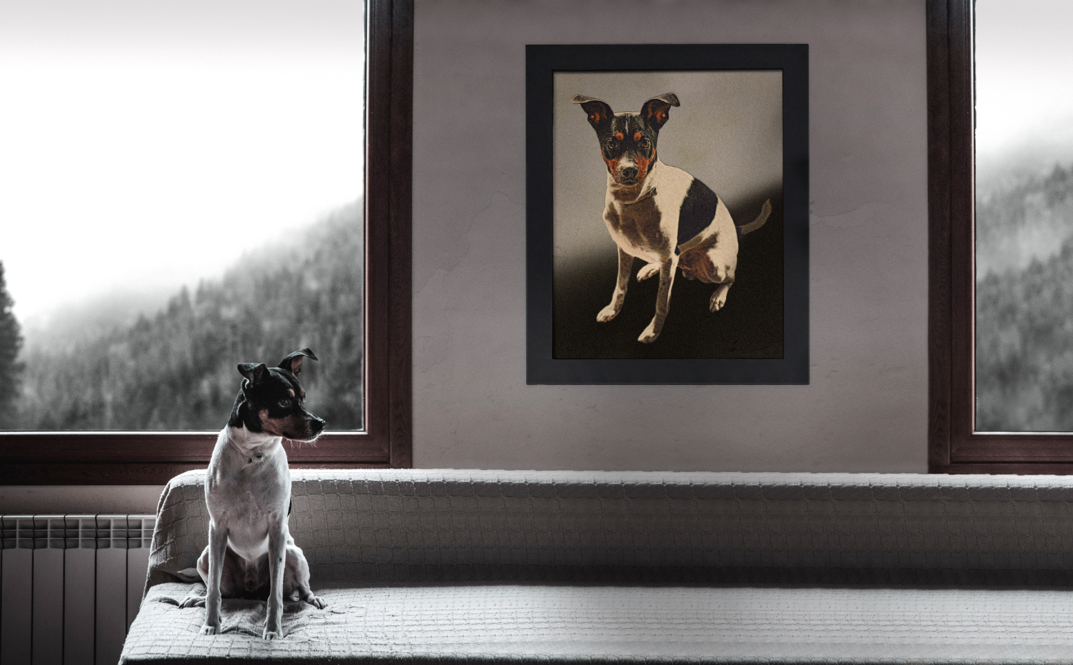 dog sitting on couch underneath a pet portrait